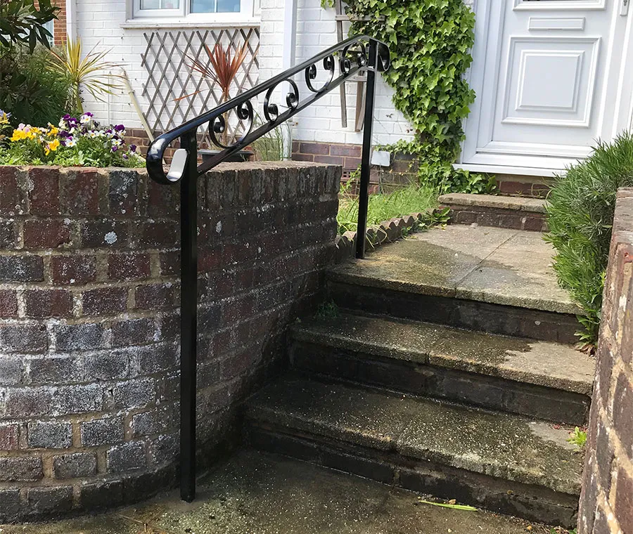 Made-to-measure handrail running alongside outdoor garden steps The Handrail People Worthing