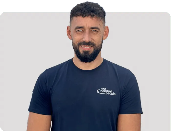 Member of The Handrail People team in branded t-shirt at the Worthing workshop